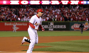 St. Louis Cardinals Lance Berkman embraces Albert Pujols after the  Cardinals won the 2011 World Series in St. Louis on October 28, 2011. The  Cardinals defeated the Texas Rangers 6-2 winning game