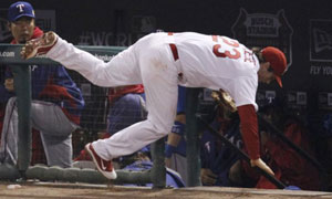 St. Louis Cardinals Lance Berkman embraces Albert Pujols after the  Cardinals won the 2011 World Series in St. Louis on October 28, 2011. The  Cardinals defeated the Texas Rangers 6-2 winning game