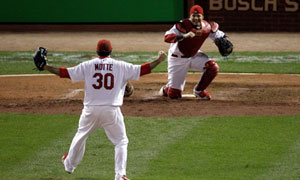 St. Louis Cardinals Lance Berkman embraces Albert Pujols after the  Cardinals won the 2011 World Series in St. Louis on October 28, 2011. The  Cardinals defeated the Texas Rangers 6-2 winning game