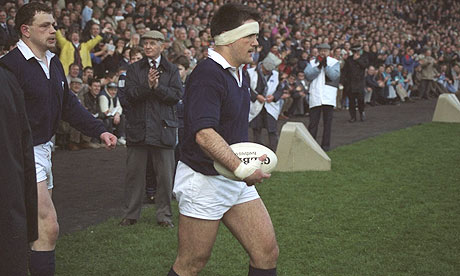 David Sole leads his Scotland team on to the field before the 1990 Five Nations Championship match