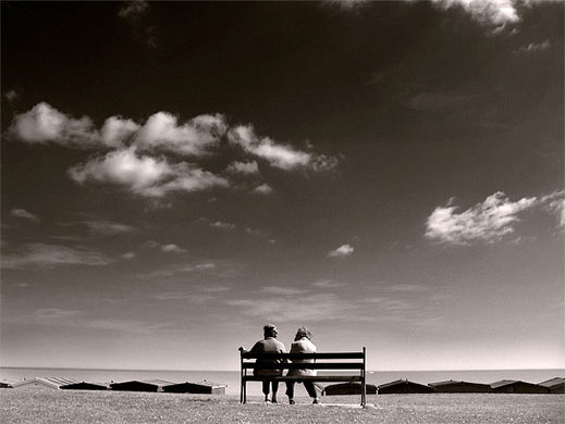 Pictures of the year: Women on seaside bench