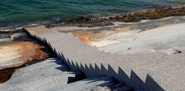 Outdoor art in Norway: Minimalist stopes lead to the sea on the Helgeland coast in northern Norway