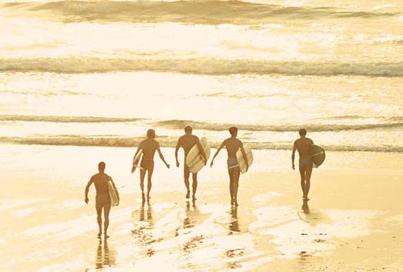 The Surfing Tribe: Surfers hit the beach