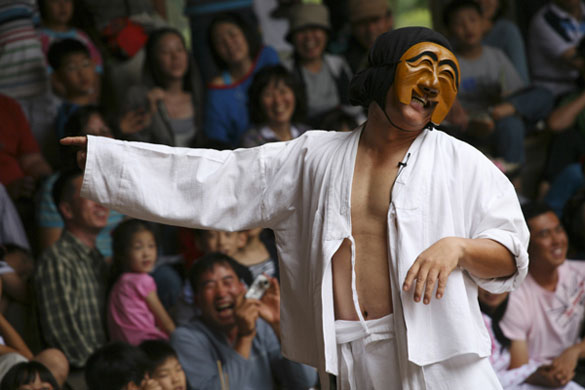 Earthbound images: Mask theatre at Hahoe folk village, South Korea
