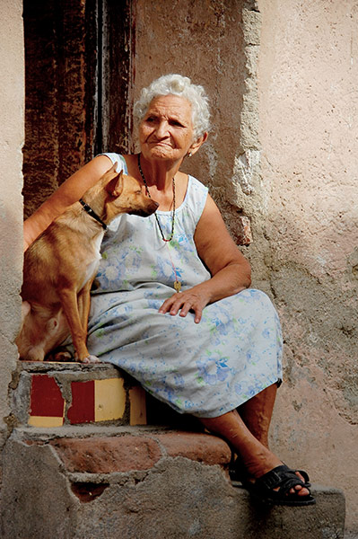 August Been there comp: Woman and dog, Cuba