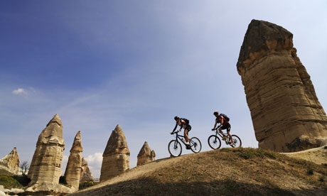 Mountainbiker in the Love Valley, Guevercinlik valley, Cappadocia, Turkey