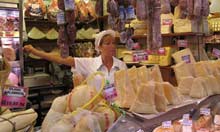 A vendor at San Remo's farmer's market in Liguria, Italy