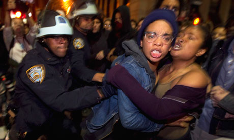 Occupy Wall St activists clash with New York Police after being removed from Zuccotti Park