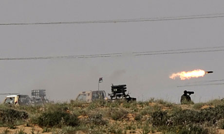 Rebels fire a missle towards near loyalist forces near  Bin Jawad